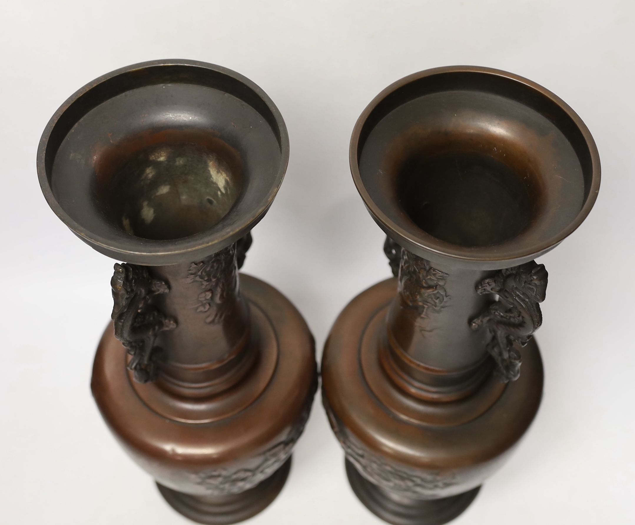 A pair of Japanese bronze vases, 38cm high